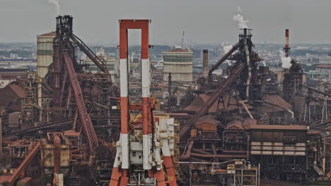 Nagoya-Japan-Aerial-v5-zoomed-tracking-flyover-captures-sprawling-industrial-site-in-Tokaimachi,-with-a-massive-steel-furnace-plant-in-full-production---Shot-with-Mavic-3-Pro-Cine---October-2023