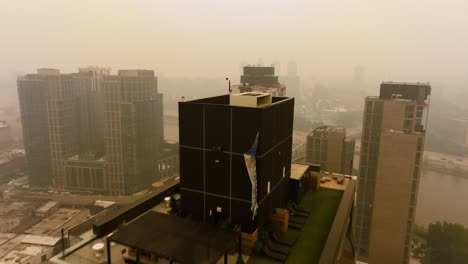 Aerial-view-of-urban-condos,-covered-in-ashy-smog-in-Mott-Haven,-New-York,-USA