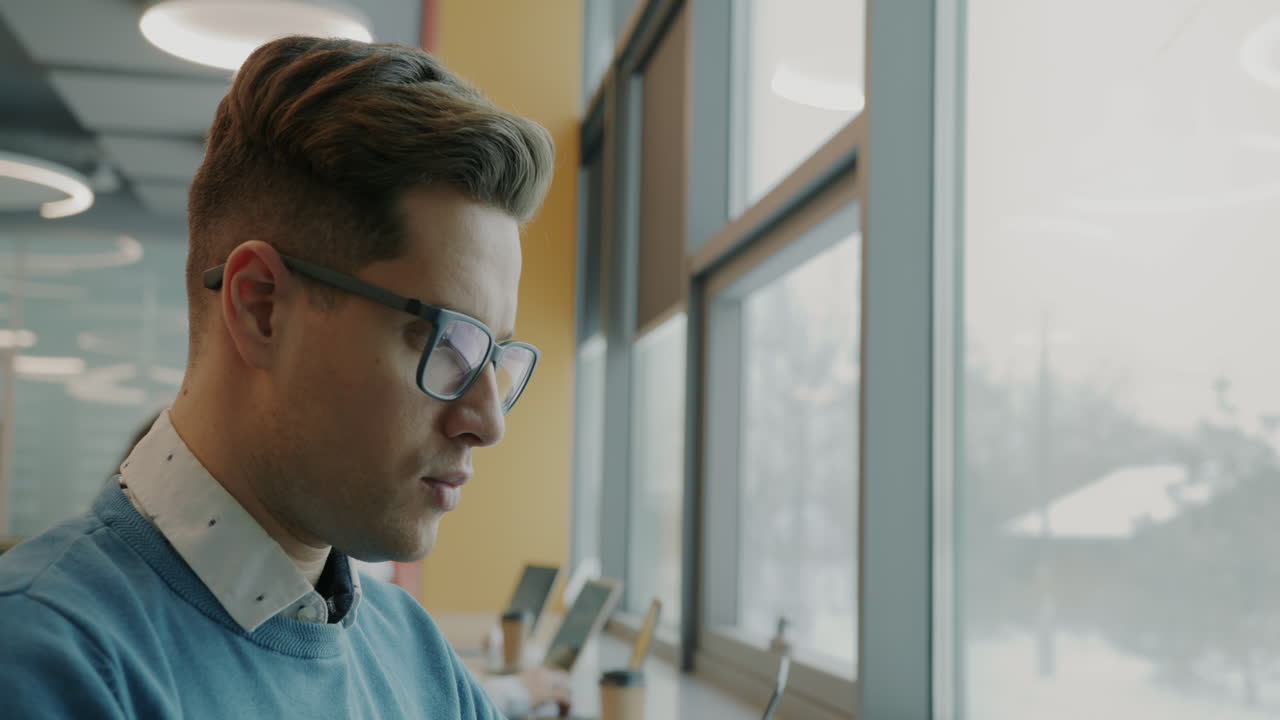 Coworkers Working in a Modern Office