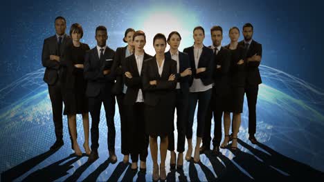 Team-of-businesspeople-standing-with-arms-crossed