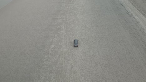 drone view driving at the white sandy terombol beach,kuching,sarawak