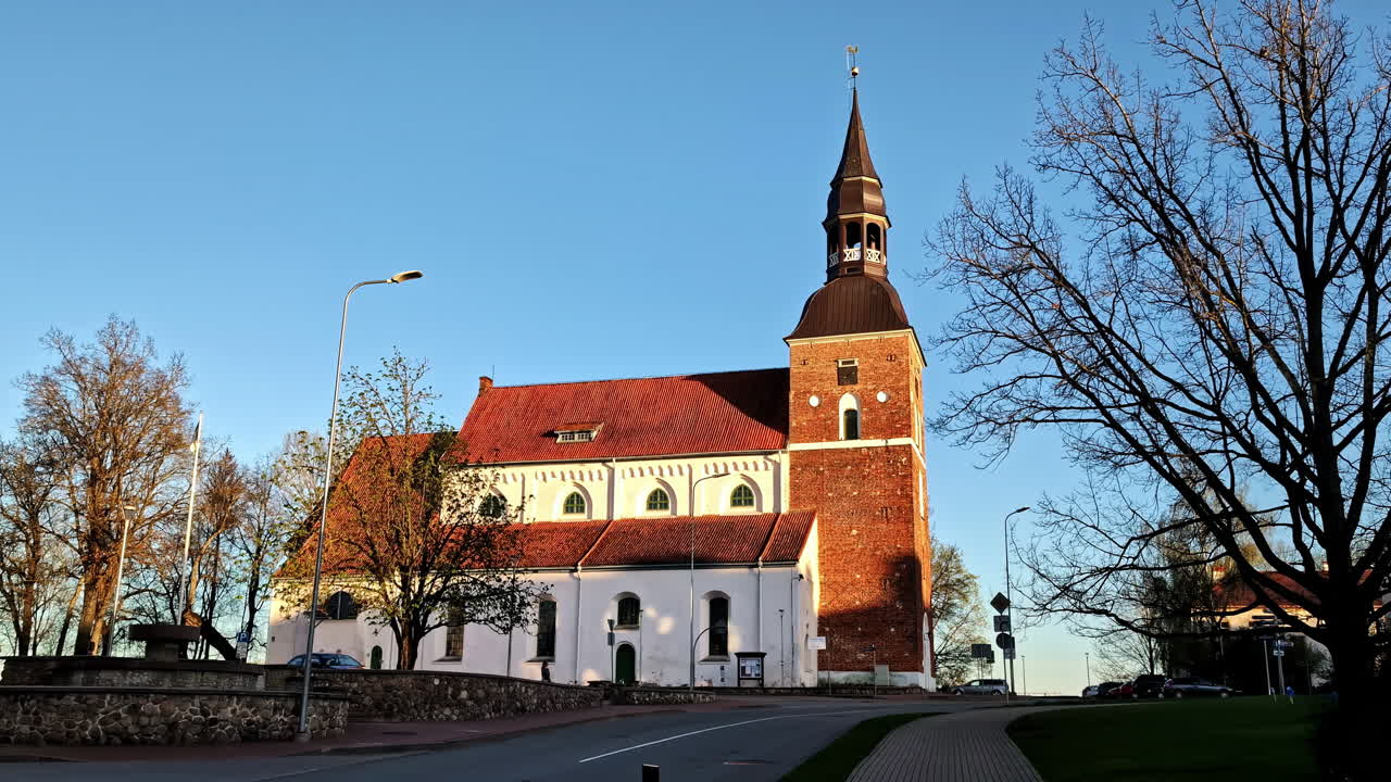St. Simon’s Church in Valmiera with golden hour sunlight in the evening
