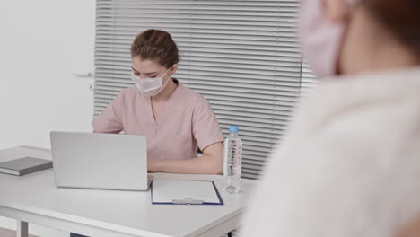 busy nurse working with patients