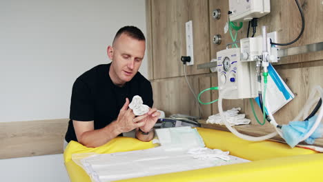 medical professional preparing equipment and supplies