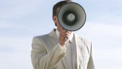 The-ultimate-businessman-with-a-portable-megaphone