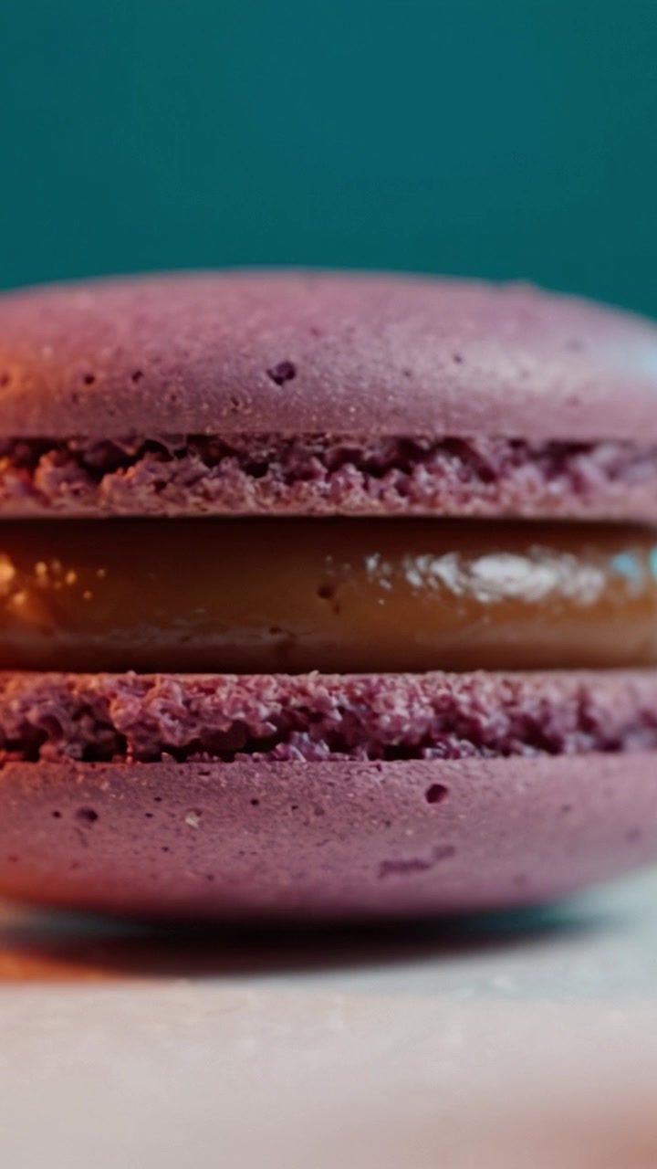 A Stunning Assortment of Colorful Macarons Showcasing Their Unique Textures and Delicate Fillings in a Beautiful Presentation Against a Calm Background