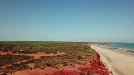 red sand dunes and beach view, australia, aerial