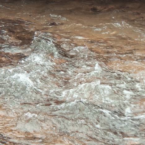 white mountain stream water falling down