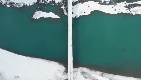 top view of a bridge covered with snow in skardu city, pakistan