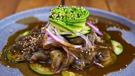 aguachile plate, traditional mexican dish on a wooden table