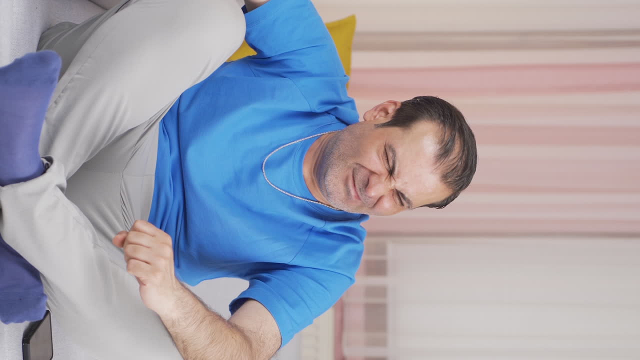 Vertical video of Aggressive and neurotic man.