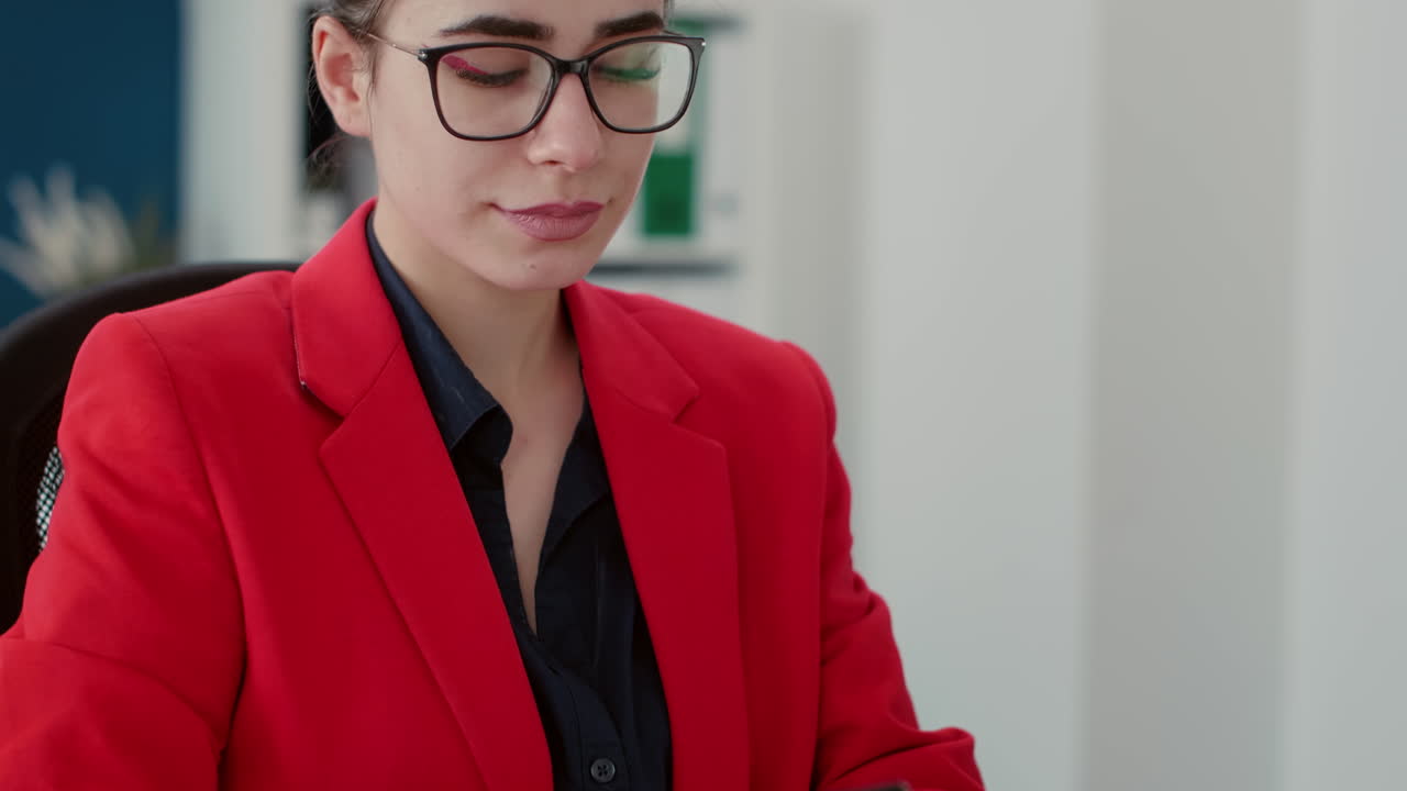 African researcher taking green leaf sample from petri dish putting under microscope
