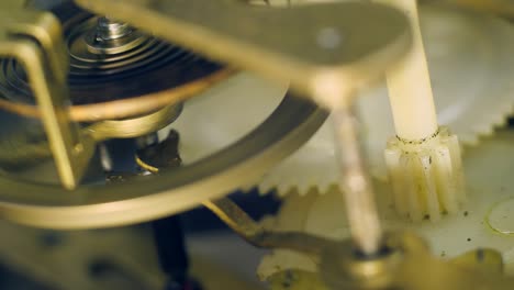 Watch mechanism macro loop.Old vintage clock mechanism working, closeup shot with soft focus.Close up of a internal clock mechanism.Vintage Watch Gears Movement Macro