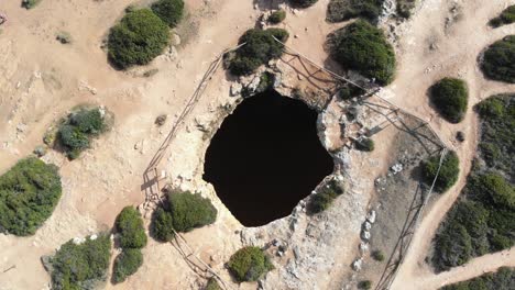 Algar-De-Benagil-secret-Cave,-outside-hole---Rocket-reveal-Aerial-shot