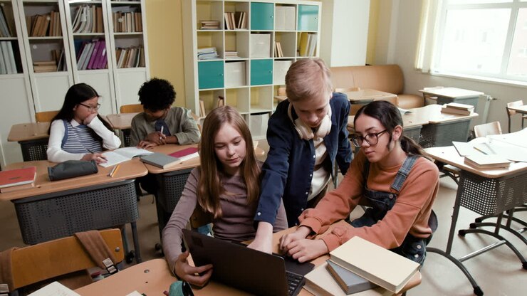 Students Collaborating and Learning in a Classroom