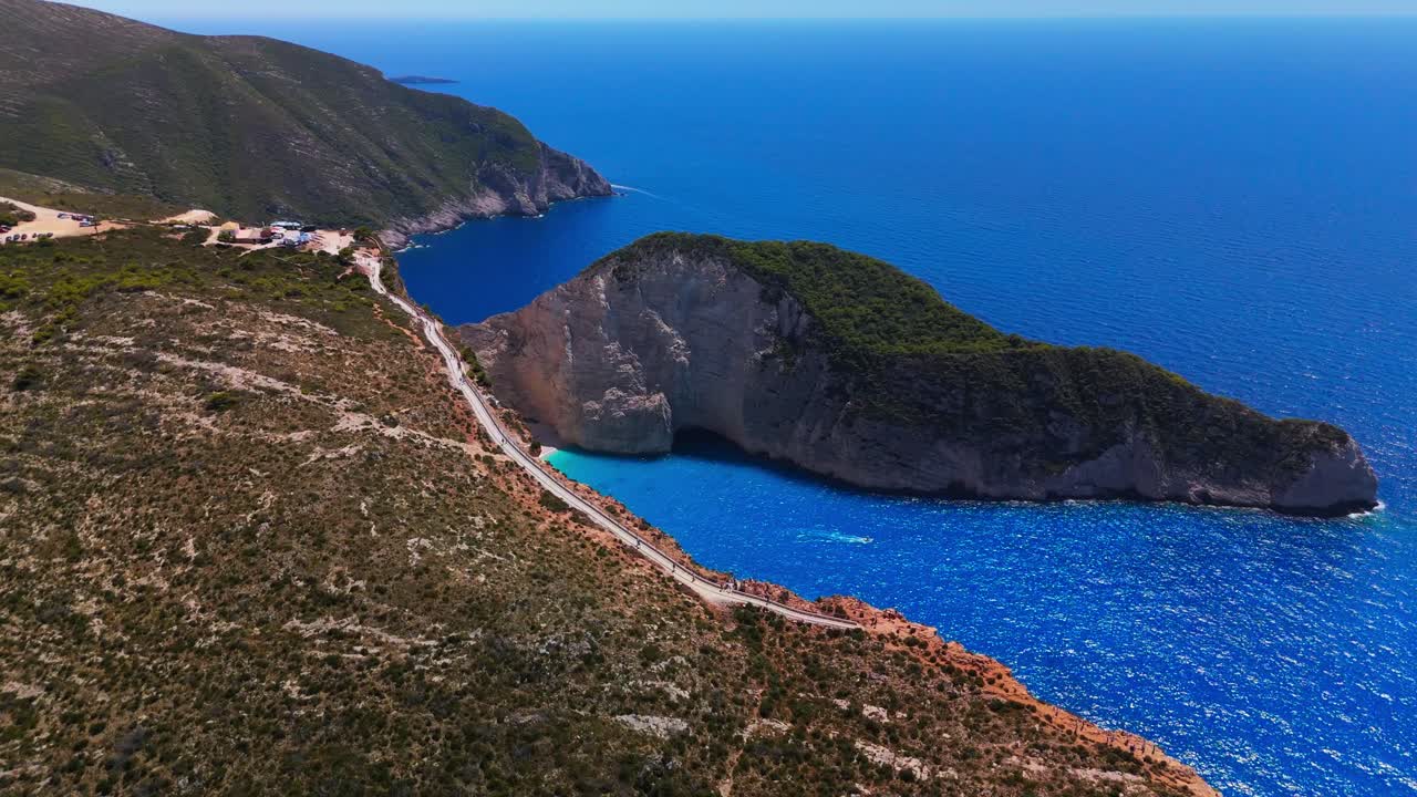 Navagio Beach, also known as Shipwreck Beach, is one of the most breathtaking spots in Greece. Located on the island of Zakynthos, this iconic cove is famous for its turquoise waters
