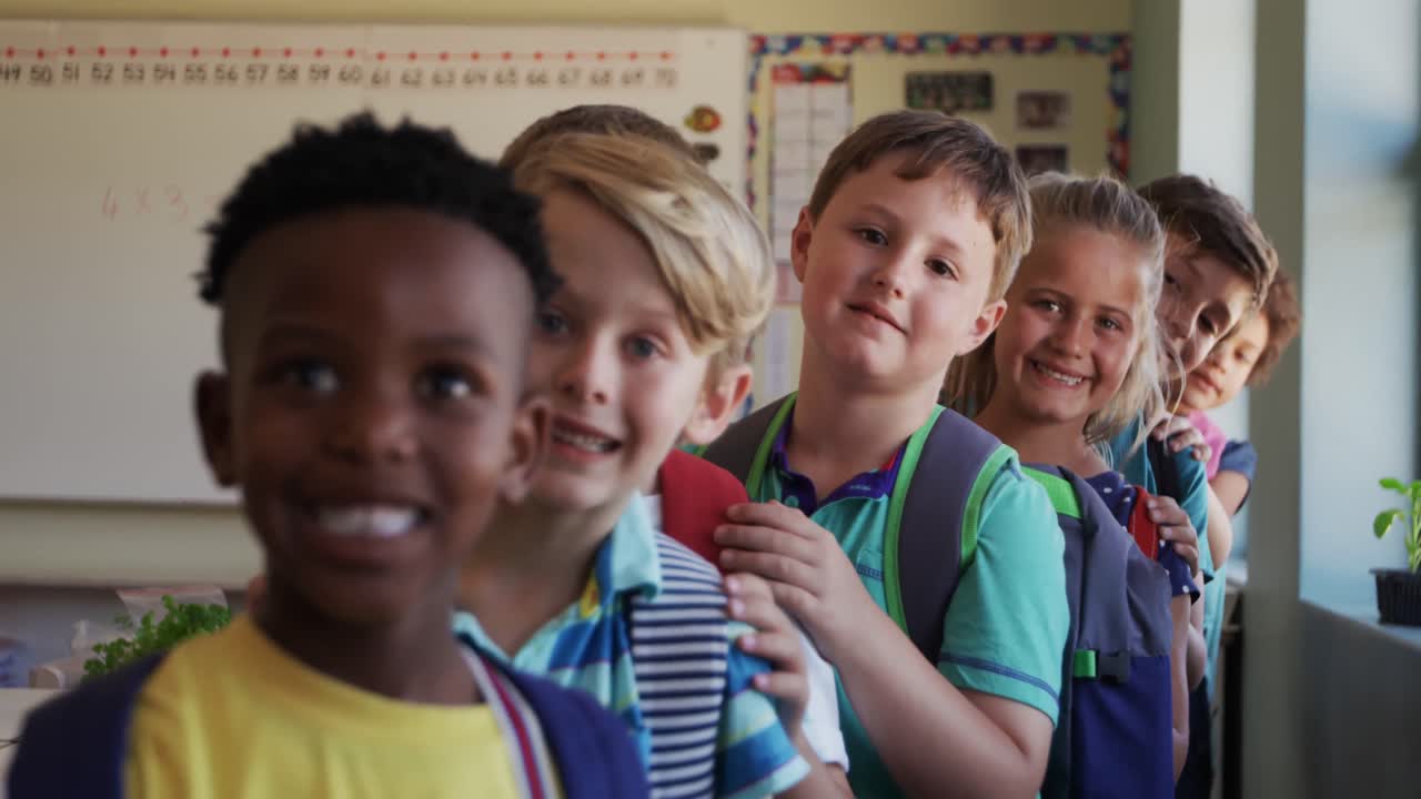 Group of kids standing in a queue in school