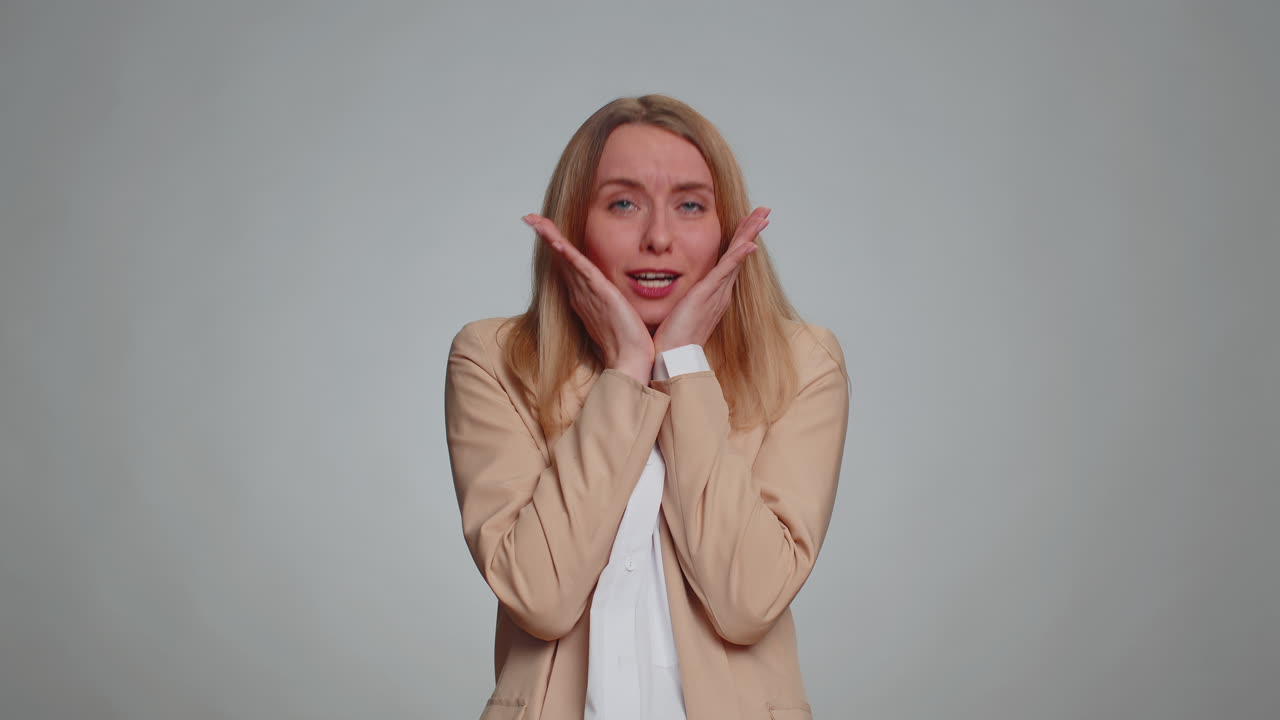 Scared fearful business woman suffering phobia anxiety disorder expresses fear stress panic