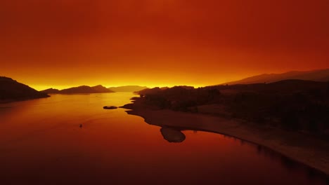 over horsetooth lake in fort collins with mountain fire smoke