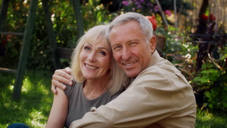 happy senior couple in garden