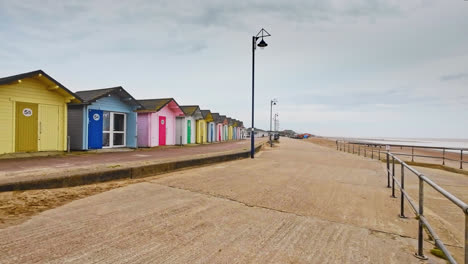 Aerial-drone-captures-vibrant-beach-huts-along-Lincolnshire-coast's-seafront