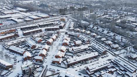 beautiful aerial of a snow covered town in the netherlands