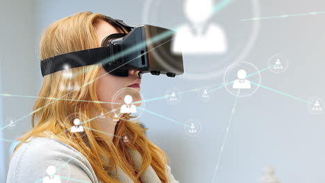 Animation of network of connections over caucasian woman using vr headset