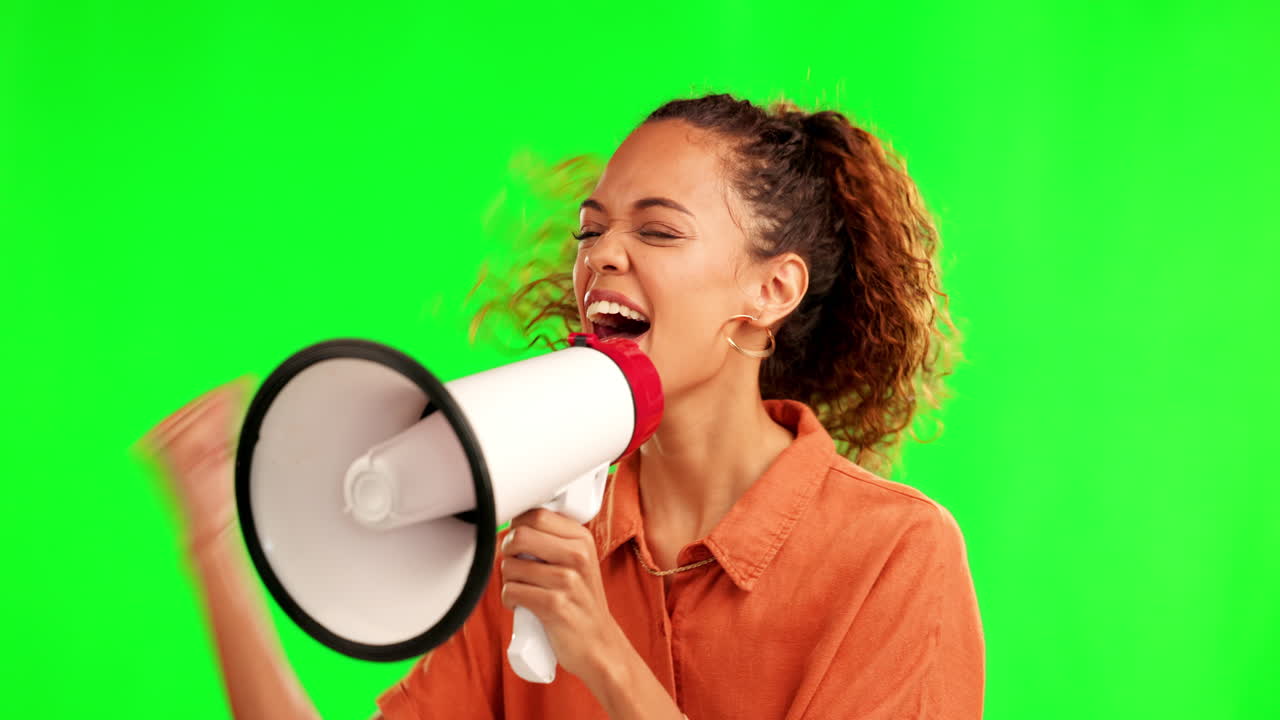 Happy woman, megaphone and shouting on green