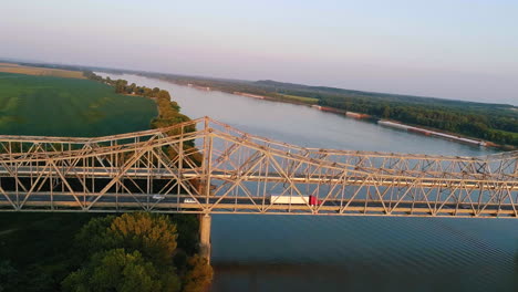 aerial shot of bi-state vietnam gold star bridge with right to left movement