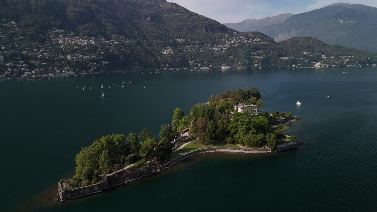 Pan shot of Lake Maggiore, the second largest lake in Italy located on the southern side of the Alps on the island of Brissago.