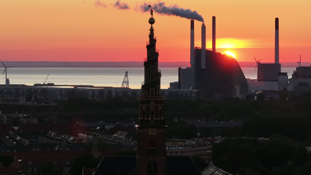 Aerial drone view of the Church of Our Saviour in the city centre of Copenhagen, Denmark at sunset