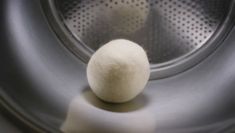 wool dryer ball in washing machine