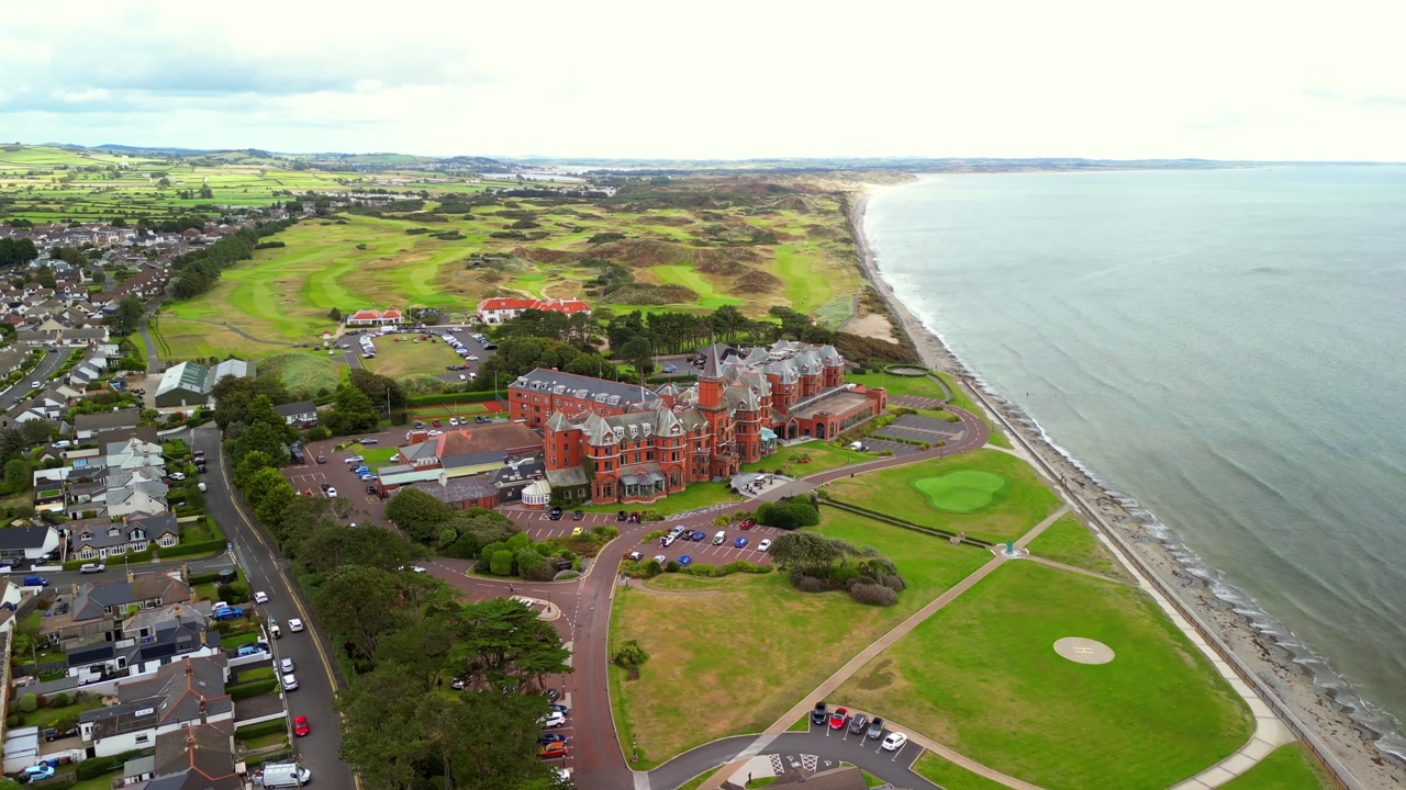 Ultra-wide aerial video of Slieve Donard Hotel and Newcastle Beach in County Down, Northern Ireland. Filmed in 4K, 30FPS and with Rec709 color.