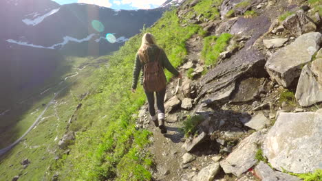 woman hiking in scenic mountains