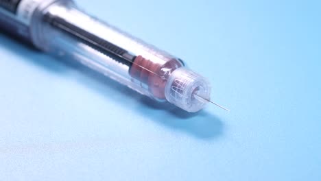 close-up of an injection pen