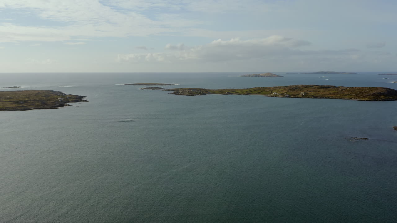 Aerial drone footage of the islands in Clifden Bay on a sunny day. Sky Road