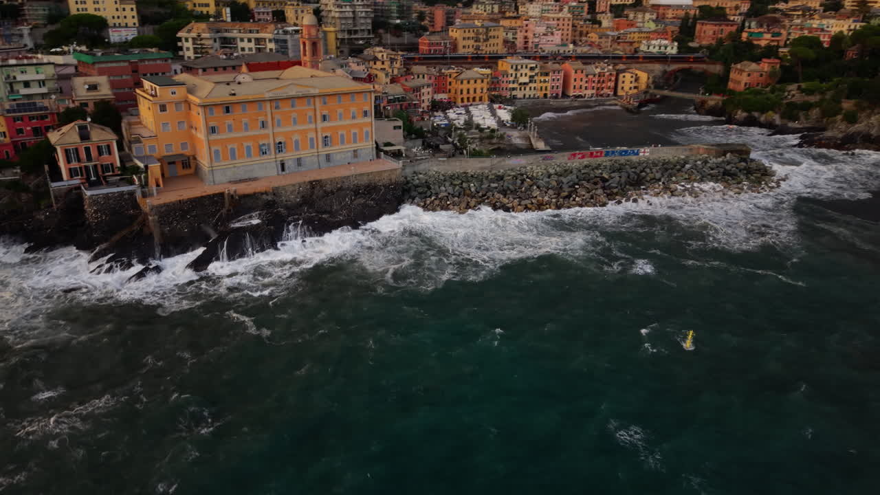 Aerial view of rocks and waves in slow motion, capturing tranquility
