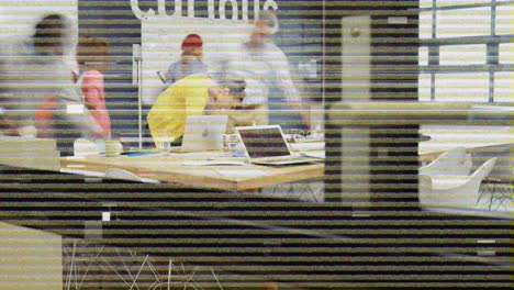 colleagues working in a busy office