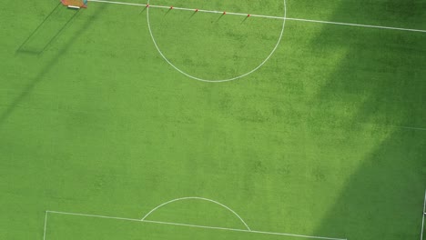 aerial view of soccer field with players training