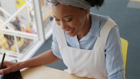 young woman working in a creative office