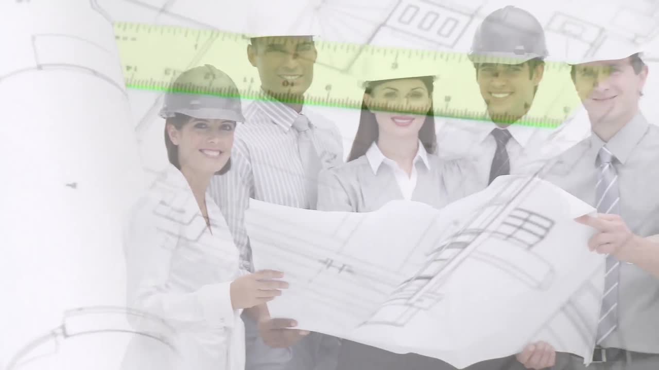 건축가와 엔지니어들이 건물 계획을 가지고 있습니다.