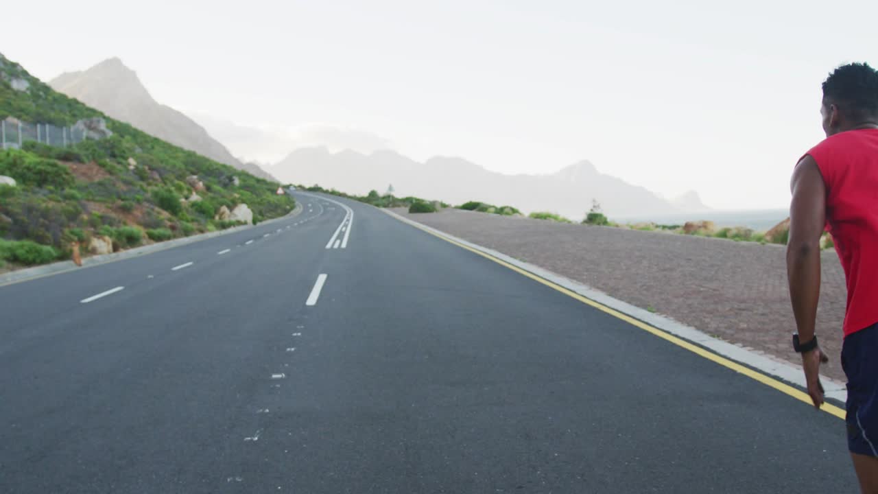Runner appearing from right, running along coastal road for fitness, causing HIGH SCORE overlay