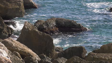 ocean waves lapping on rocky coastline