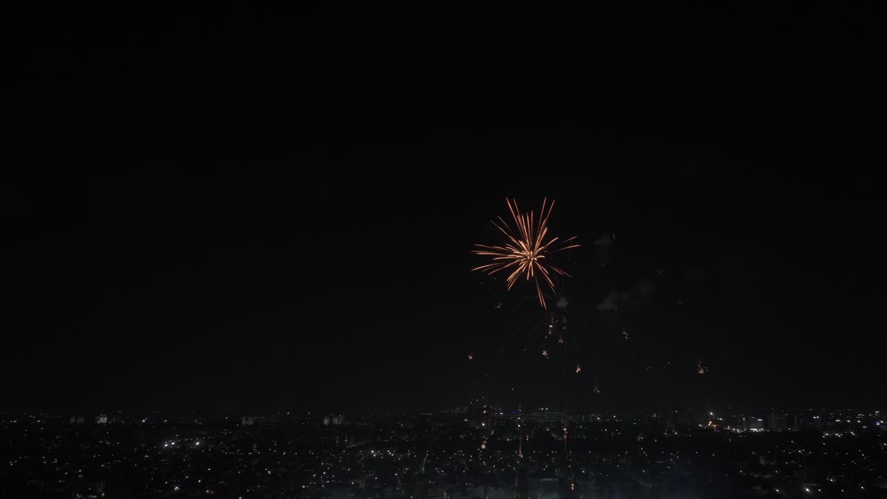 Bursting of firecrackers in sky during night time in Chennai, India