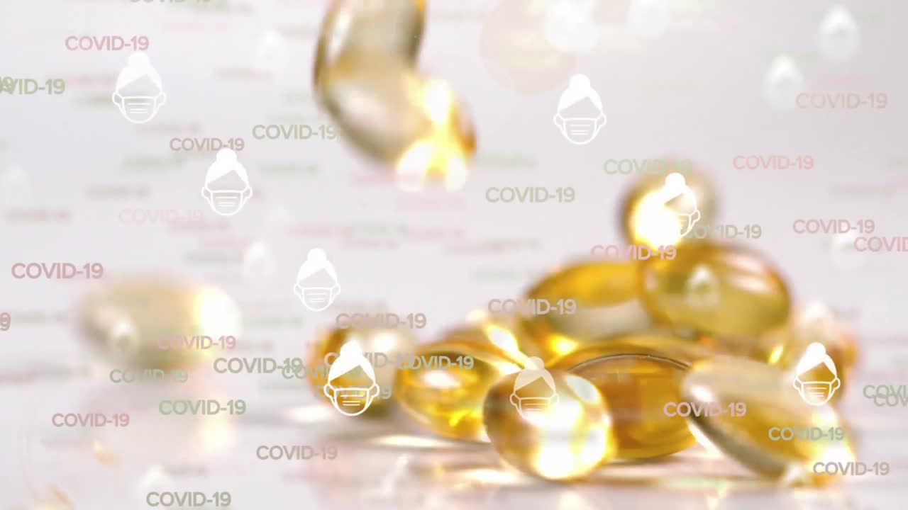 떨어지는 알약 위에 떠다니는 여러 코로나19 단어와 아이콘의 애니메이션