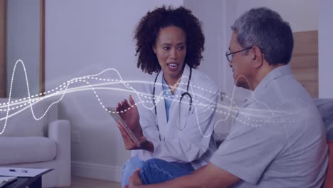 Animation-of-white-lines-over-diverse-doctor-and-patient-using-tablet