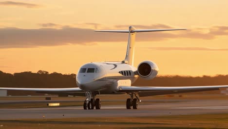 a private jet at sunset