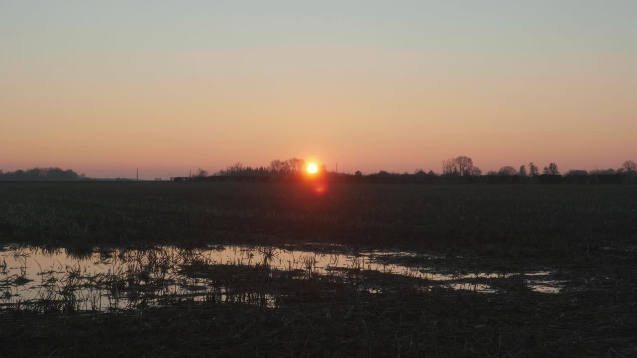 4K Cinematic scenic still shot of a field during sunset in the French countryside.