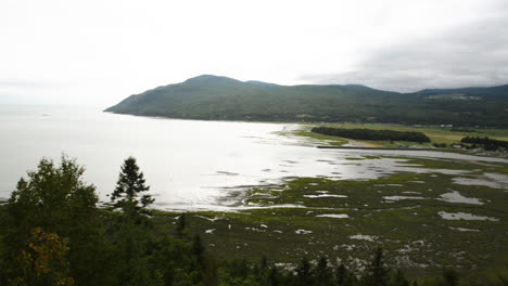 Pan-across-the-scenic-landscape-of-the-Gaspe-region-of-Quebec-along-the-St