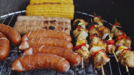 Sausages-and-vegetables-cooking-on-grill